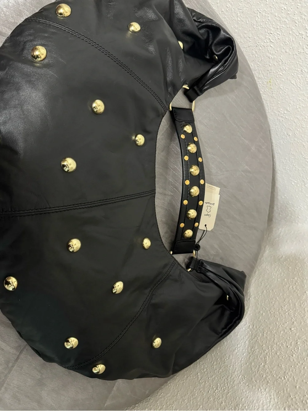 Chevignon Leather Black  Hobo with Gold Studded accents .